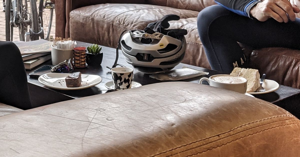Coffee and cake on a table at HUP! Cafe in Forest Row