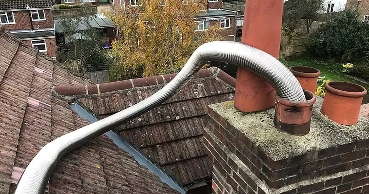 A chimney liner being fitted by Happy Chimney Sweep