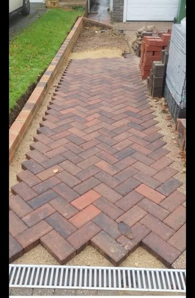 Driveway and brick retaining wall by Ormani Property Services